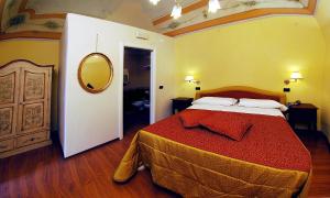 Posteľ alebo postele v izbe v ubytovaní Hotel Di Stefano