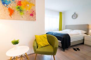 Postel nebo postele na pokoji v ubytování Vienna Residence, Rochusmarkt - Wien Mitte