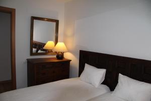 Posteľ alebo postele v izbe v ubytovaní Apartaments Centre Figueres