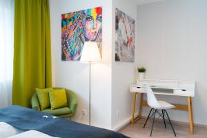 Postel nebo postele na pokoji v ubytování Vienna Residence, Rochusmarkt - Wien Mitte