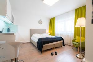 Postel nebo postele na pokoji v ubytování Vienna Residence, Rochusmarkt - Wien Mitte