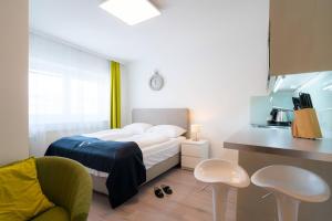 Postel nebo postele na pokoji v ubytování Vienna Residence, Rochusmarkt - Wien Mitte