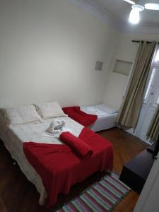 Katil atau katil-katil dalam bilik di Casa da Praia
