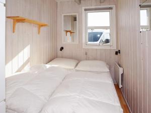 Postel nebo postele na pokoji v ubytování Seaside Charm in Bork Havn - By Traum Ferienwohnungen