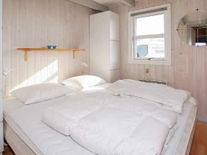 Postel nebo postele na pokoji v ubytování Seaside Charm in Bork Havn - By Traum Ferienwohnungen