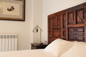 Posteľ alebo postele v izbe v ubytovaní Apartaments Centre Figueres