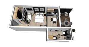 a floor plan of a bedroom and a living room at Le Tilotine alizetropical in Le Moule