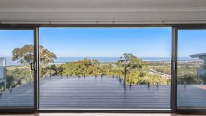 a view from the window of a house at Sea For Miles in Lakes Entrance
