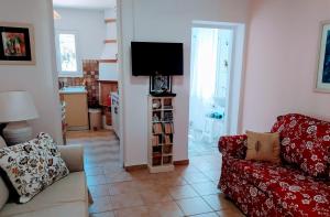 TV a/nebo společenská místnost v ubytování Villa Ireni Waterfont