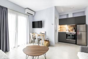 Kuchyň nebo kuchyňský kout v ubytování Art Central Suites