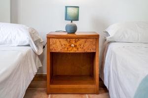 Postel nebo postele na pokoji v ubytování Santa Eulalia