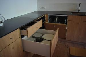 a kitchen with a counter with a toilet in it at Haus Bianca in Schoppernau