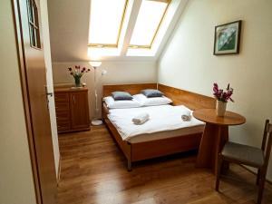 Posteľ alebo postele v izbe v ubytovaní Apartamenty i Pokoje u Doroty