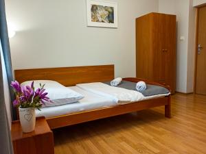 Posteľ alebo postele v izbe v ubytovaní Apartamenty i Pokoje u Doroty