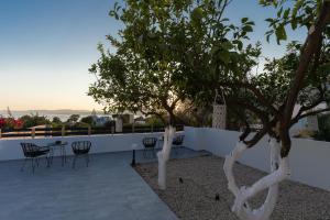 Balkón alebo terasa v ubytovaní POUNEDES LUXURY SUITES