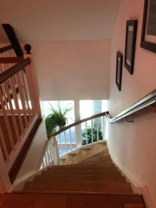 a staircase in a house with a stair case at Susannes B&B in Västerbo