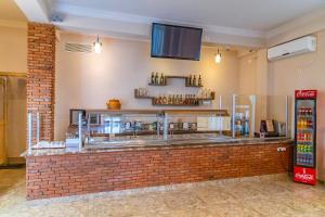 Kuchyň nebo kuchyňský kout v ubytování Samni Hotel