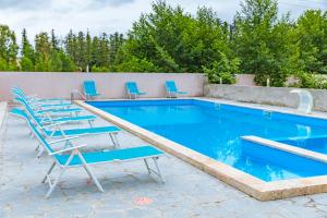 Bazén v ubytování Samni Hotel nebo v jeho okolí