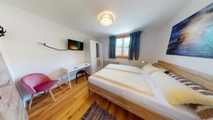 Postel nebo postele na pokoji v ubytování Apartementhaus Schöndorfer