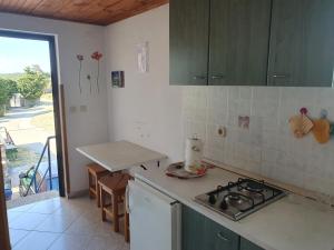 Kuchyň nebo kuchyňský kout v ubytování Apartman Letizia