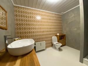 Koupelna v ubytování N1 Apartment in the heart of Højer
