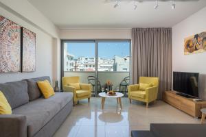 Posedenie v ubytovaní Trianon Luxury Apartments & Suites