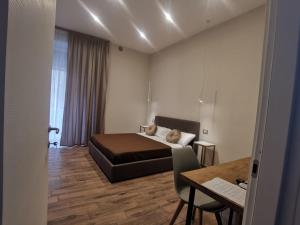 Posteľ alebo postele v izbe v ubytovaní TOLEDO CLASS