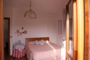 Ліжко або ліжка в номері Casa Vacanze Le Terrazze