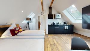 Ein Bett oder Betten in einem Zimmer der Unterkunft Pension Bottwartal