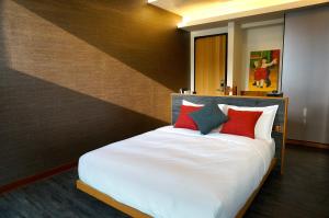 EG 南投住宿房間的床