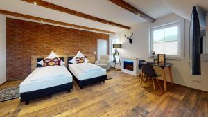 Ein Bett oder Betten in einem Zimmer der Unterkunft Pension Bottwartal