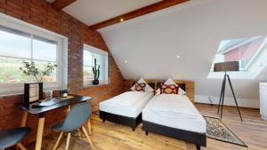 Ein Bett oder Betten in einem Zimmer der Unterkunft Pension Bottwartal