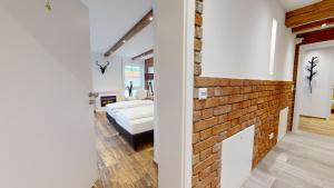 Ein Bett oder Betten in einem Zimmer der Unterkunft Pension Bottwartal