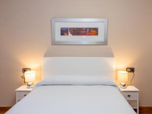 Posteľ alebo postele v izbe v ubytovaní Gestión de Alojamientos Apartments