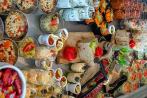 a display case with many different types of food at VTF Le Domaine du Peyrichoux in Singleyrac +30 photos