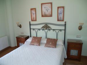 Postel nebo postele na pokoji v ubytování Hotel Las Torres