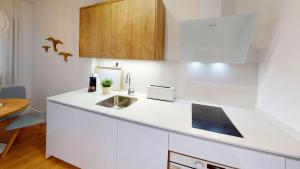 Кухня или мини-кухня в Apartamentos La Casa El Palo
