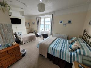 Katil atau katil-katil dalam bilik di Lyndale Guest House
