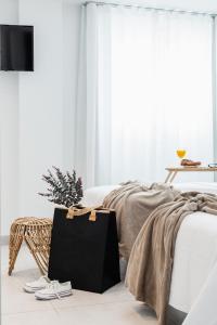 A bed or beds in a room at Apartamentos Martalia Nerja
