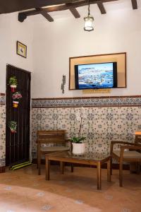 TV a/nebo společenská místnost v ubytování Hostal San Francisco