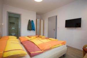 Postel nebo postele na pokoji v ubytování apartmany Zak