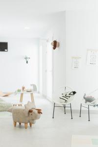 A television and/or entertainment centre at Apartamentos Martalia Nerja