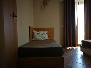 Postel nebo postele na pokoji v ubytování Casa Duci