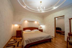 Postel nebo postele na pokoji v ubytování Hotel Palace Ukraine