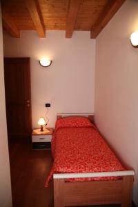 Rúm í herbergi á Albergo diffuso Valcellina e Val Vajont in Cimolais