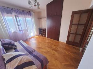 Posteľ alebo postele v izbe v ubytovaní Apartment 2