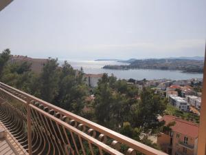 a view of a city and a lake from a balcony at Apartment 2 in Podstrana