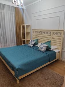 Postel nebo postele na pokoji v ubytování Гостевой дом Ривьера