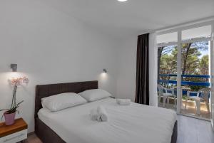 Hotel Alem客房内的一张或多张床位