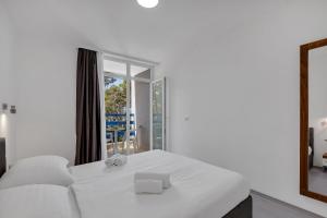 Hotel Alem客房内的一张或多张床位